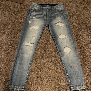 Like New Buckle Black Curvy Mid Rise Ankle Skinny Jean